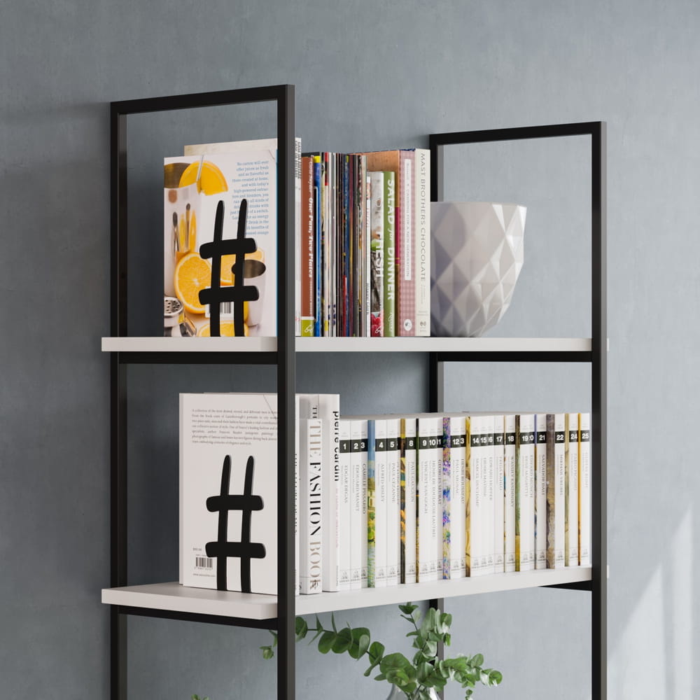 Βιβλιοστάτης μαύρος μεταλλικός δίεση σε βιβλιοθήκη