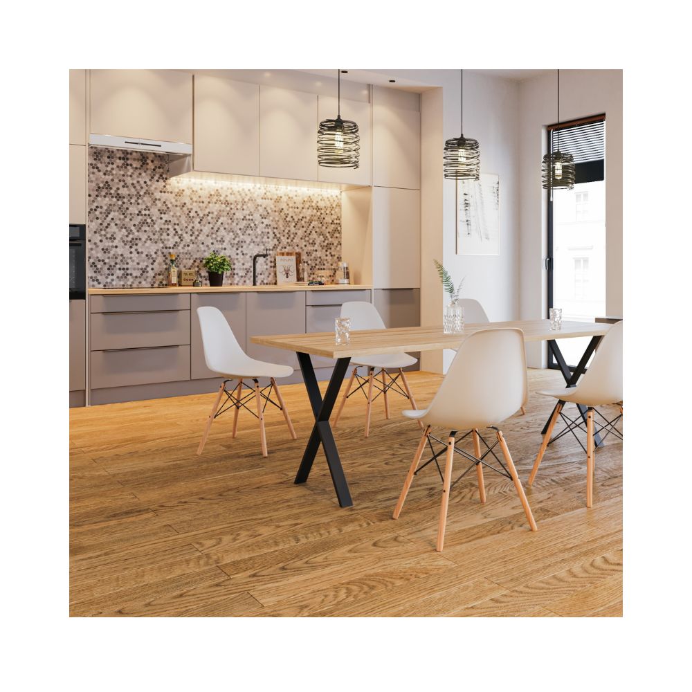 Μία μοντέρνα κουζίνα με ένα μεγάλο τραπέζι με μαύρα μεταλλικά πόδια χιαστή